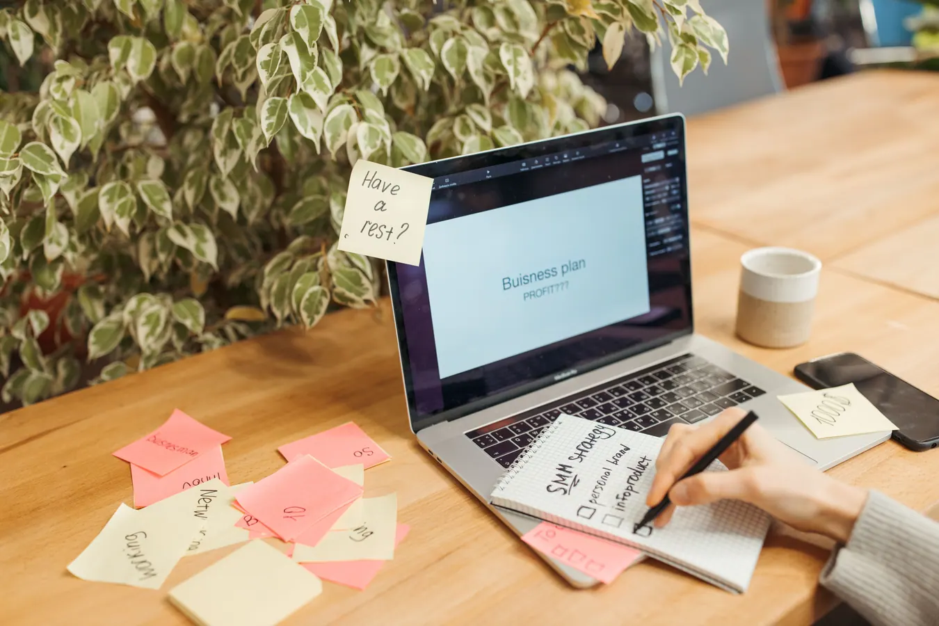 Illustration: planning workspace with sticky notes and laptop