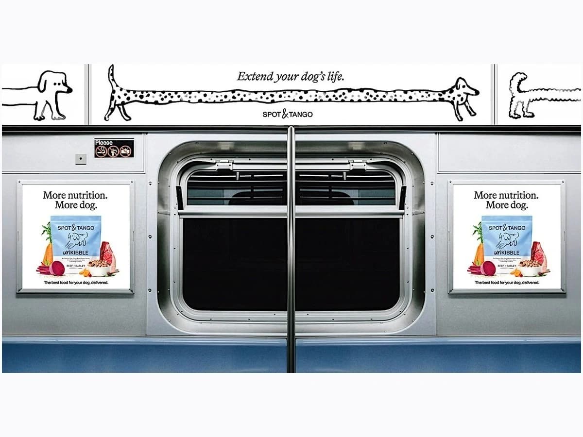 Spot & Tango brand advertising displayed inside a train carriage